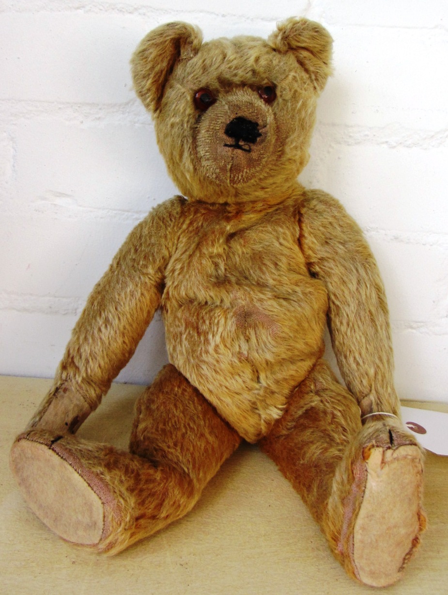 Appraisal: A Farnell teddy bear circa with orange glass eyes handstitched