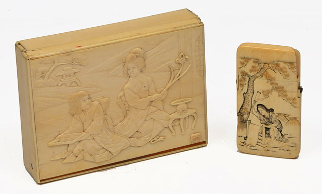 Appraisal: A TH CENTURY JAPANESE CARVED IVORY CARD CASE depicting a