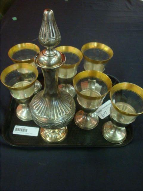 Appraisal: Silver Decanter together with Sterling Inserts with Glasses Some bases