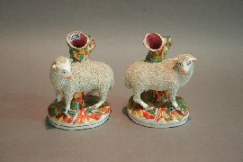 Appraisal: A Staffordshire spill vase modelled with a sheep