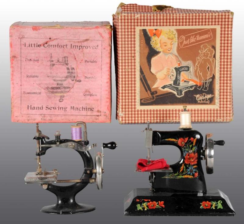 Appraisal: Lot of Metal Child's Toy Sewing Machines Description Both in