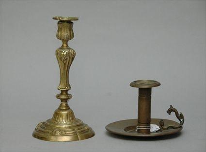 Appraisal: Chamberstick together with a Single Candlestick