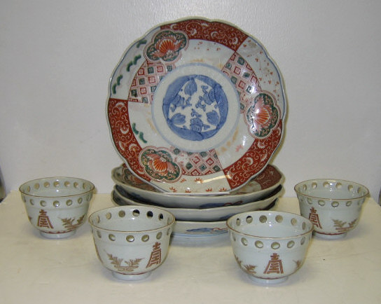 Appraisal: EIGHT PIECES JAPANESE PORCELAIN Four scalloped plates decorated in Kutani