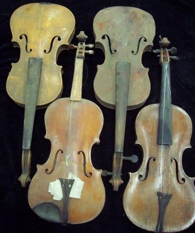 Appraisal: Four uncased violins dilapidated condition