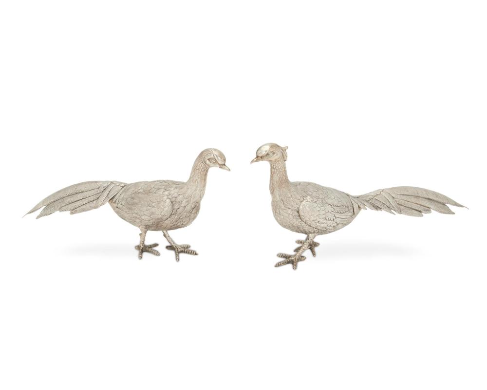 Appraisal: A pair of Spanish silver pheasants First-quarter th Century With