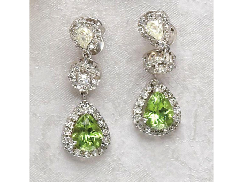 Appraisal: PERIDOT EARRINGS k white gold earrings set with two pear