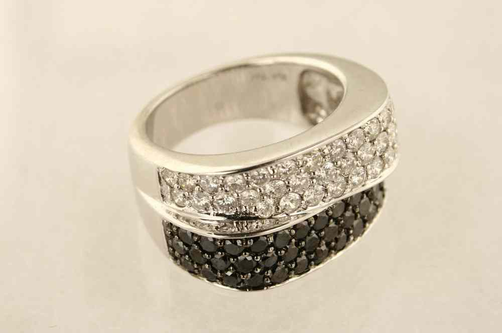 Appraisal: LADY'S RING - K white gold contemporary bypass design ring