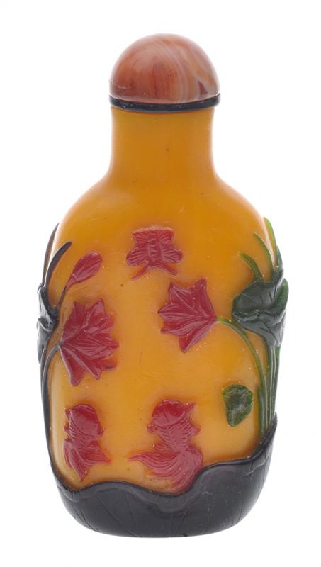 Appraisal: A FOUR COLOUR OVERLAY ON YELLOW GLASS SNUFF BOTTLE WITH