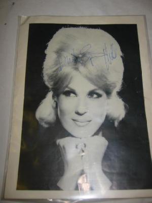 Appraisal: A concert programme including the autographed photos of Dusty Springfield