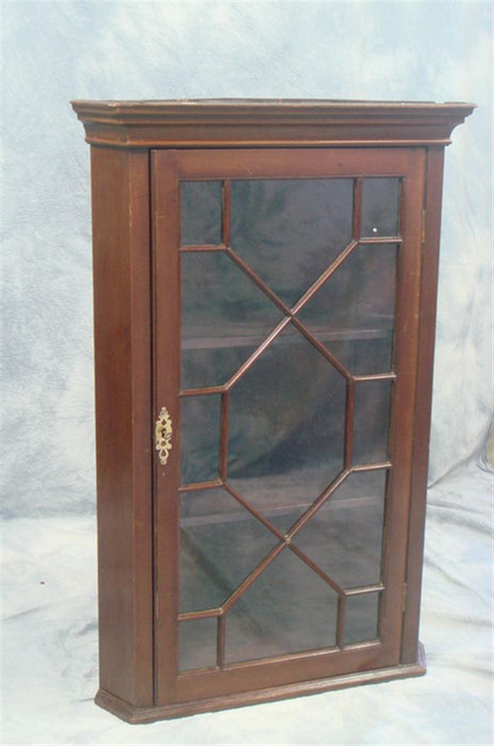 Appraisal: Mahogany Georgian hanging corner cabinet lattice work glazed door h