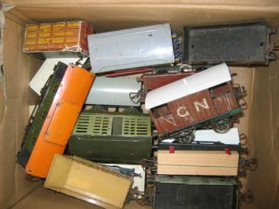 Appraisal: Twenty playworn Hornby goods trucks including milk vans coal trucks