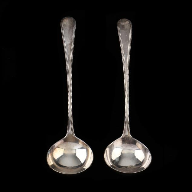 Appraisal: PAIR OF GEORGE III SILVER LADLES MARK OF HESTER BATEMAN