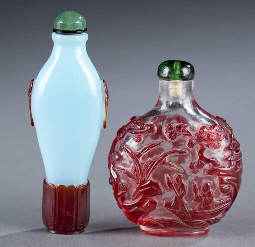 Appraisal: Two Chinese glass overlay glass snuff bottles Two Chinese glass