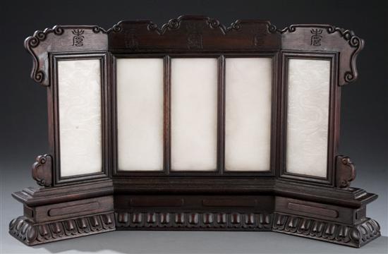 Appraisal: Chinese jade and wood table screen Having five white jade