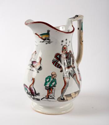 Appraisal: A Staffordshire harlequin puzzle jug with transfer printed decoration of