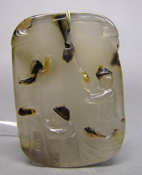 Appraisal: A Suzhou agate toggle Of rounded rectangular profile carved in