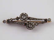 Appraisal: An antique carat gold rose cut diamond brooch approx cm