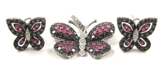 Appraisal: THREE ARTICLES OF BLACK DIAMOND AND PINK SAPPHIRE JEWELRY including