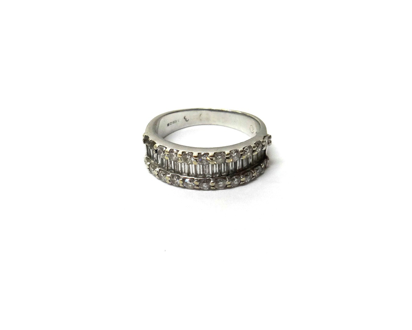 Appraisal: An ct white gold and diamond set half hoop ring