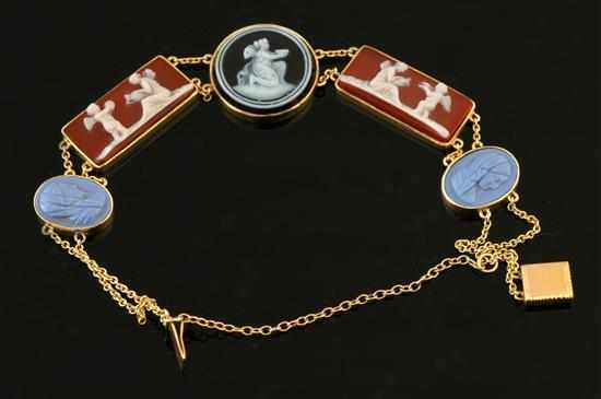 Appraisal: An Edwardian style cameo bracelet Comprising onyx and porcelain cameos