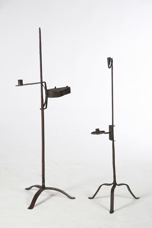 Appraisal: TWO FLOOR LAMPS American th century wrought iron Rushlight with