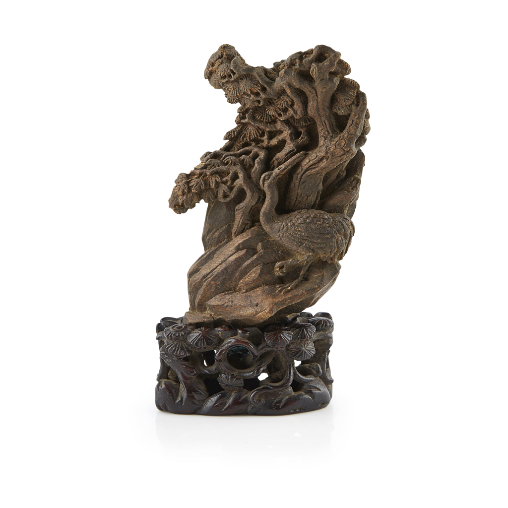 Appraisal: SMALL SCENTED WOOD CARVING OF A BOULDER finely carved to