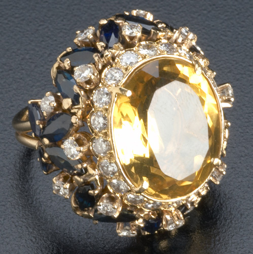 Appraisal: Citrine and sapphire ring with diamonds in k yg Oval