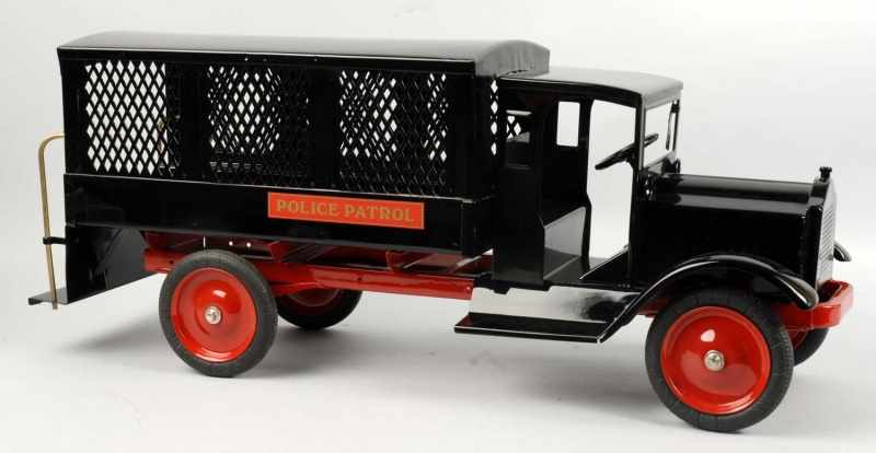 Appraisal: Pressed Steel Keystone Police Patrol Truck Toy Description Black rubber