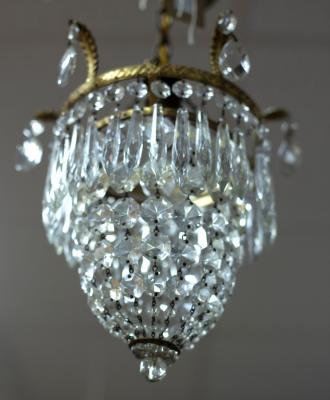 Appraisal: An early th Century ceiling light hung with prismatic drops