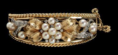 Appraisal: Pearl diamond bangle bracelet floral design rope border accented with