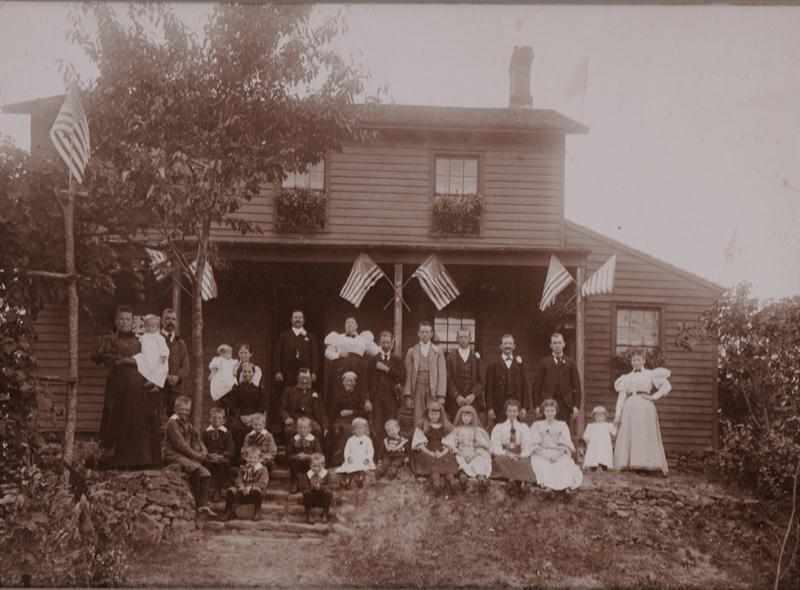 Appraisal: UNKNOWN FAMILY GATHERING AT THE HOMESTEAD Toned bromide print Provenance