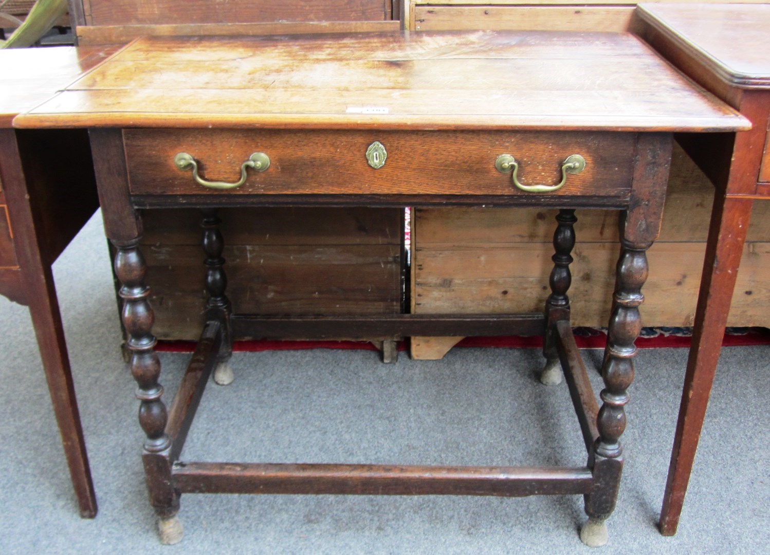 Appraisal: A th century Charles II style single drawer side table