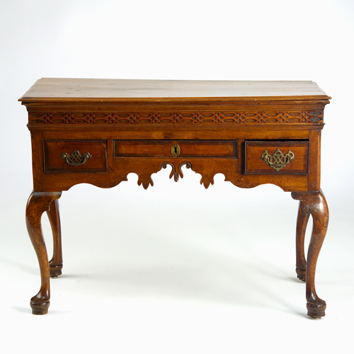 Appraisal: Georgian softwood lowboy with carved detail and cabriole legs with