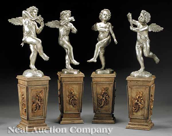 Appraisal: A Set of Four Silvered Bronze Musical Putti each cavorting