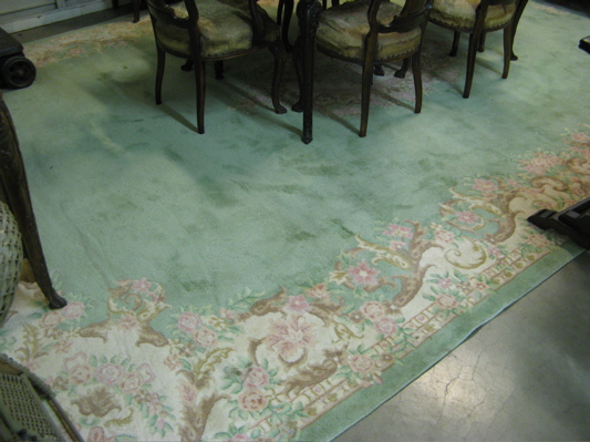 Appraisal: HAND KNOTTED ORIENTAL CARPET Indo-Aubusson central floral medallion on plain