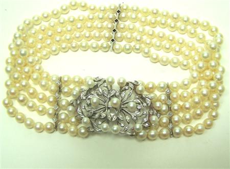 Appraisal: An early th century cultured pearl and diamond choker composed