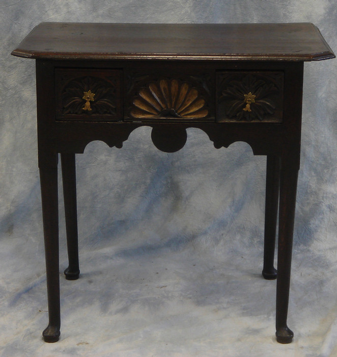 Appraisal: English oak Queen Anne lowboy fan carved drawer front h