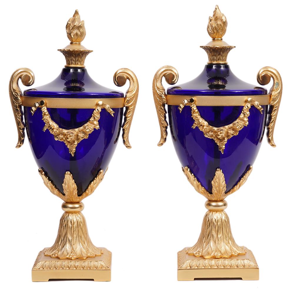 Appraisal: COBALT GLASS AND GILT BRONZE URNSCobalt blue glass urns with