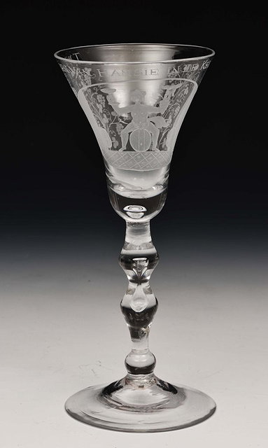 Appraisal: A NEWCASTLE WINE GLASS with engraved oval panel and vine