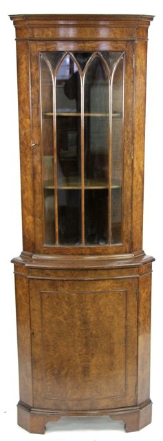 Appraisal: A th Century bow fronted corner cupboard with glazed upper