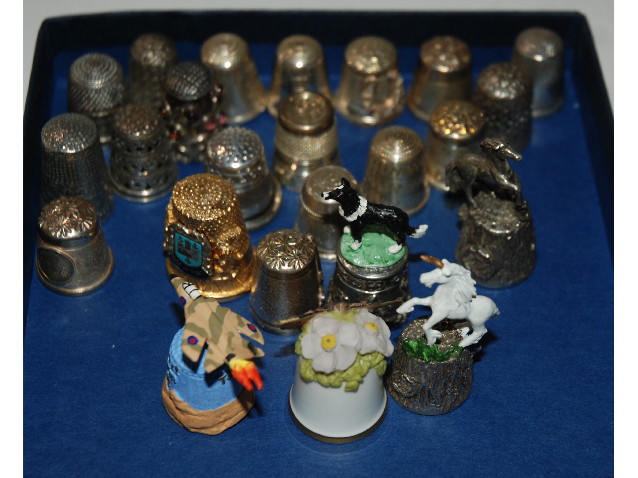 Appraisal: A lot comprising fifteen assorted silver thimbles and nine novelty