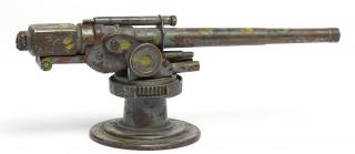 Appraisal: Vintage Painted Bronze Tabletop Anti The gun turns and elevates