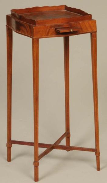 Appraisal: Georgian Kettle Stand with Candle Slide Description th Century Mahogany