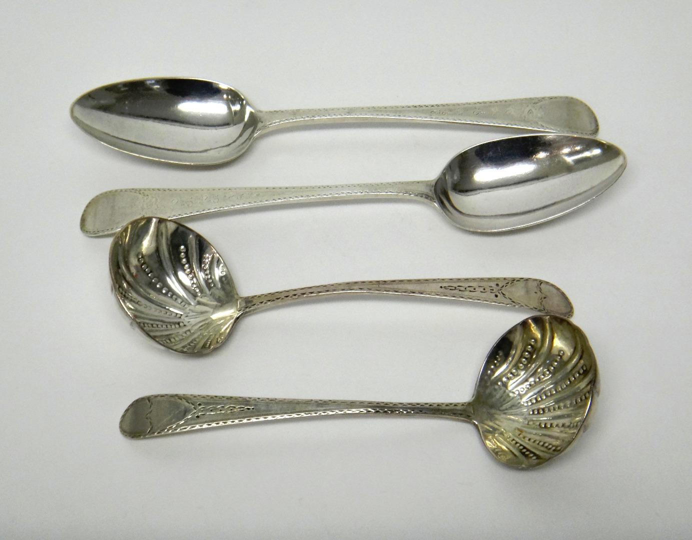 Appraisal: Silver comprising a pair of George III tablespoons bright cut