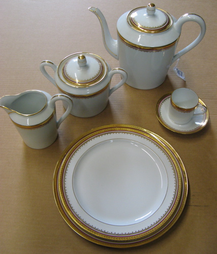 Appraisal: SEVENTY PIECE LIMOGES FRANCE PORCELAIN DINNER SET gold red and