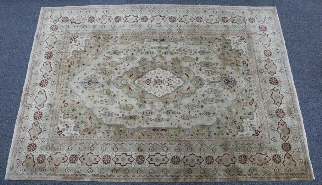 Appraisal: Hand knotted Persian rug with cream reds and light blue