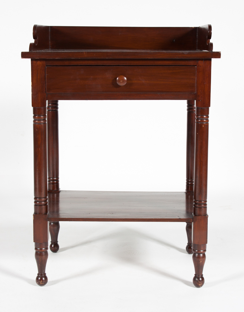 Appraisal: Classical Pennsylvania stained wood washstand circa flat top with raised