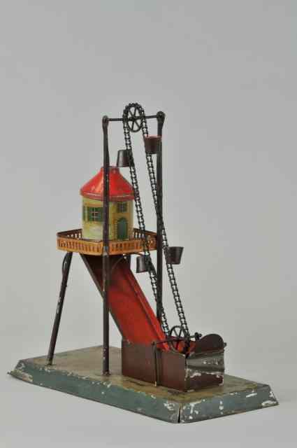 Appraisal: DREDGE STEAM ACCESSORY Germany possible Carette four tin buckets on