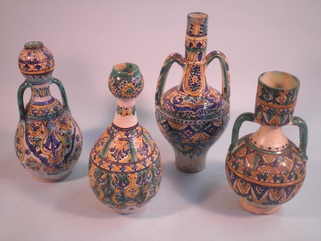 Appraisal: Four early thC Iznic type vases each decorated in blue