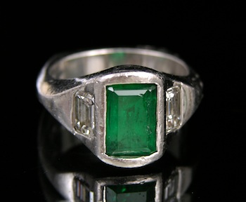 Appraisal: An Impressive Emerald and Diamond Ring in Platinum An impressive